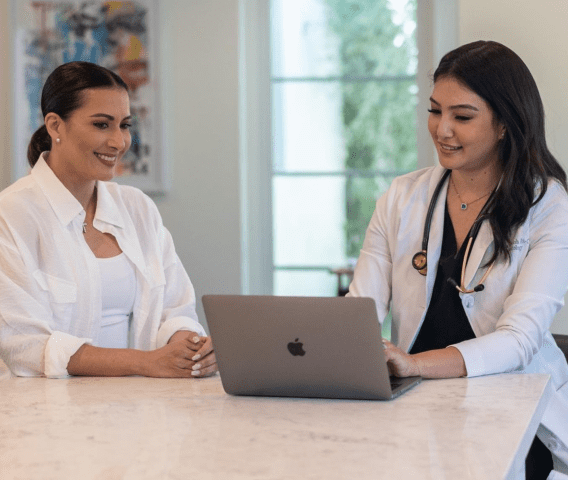 Clinician reviewing lab results with a patient